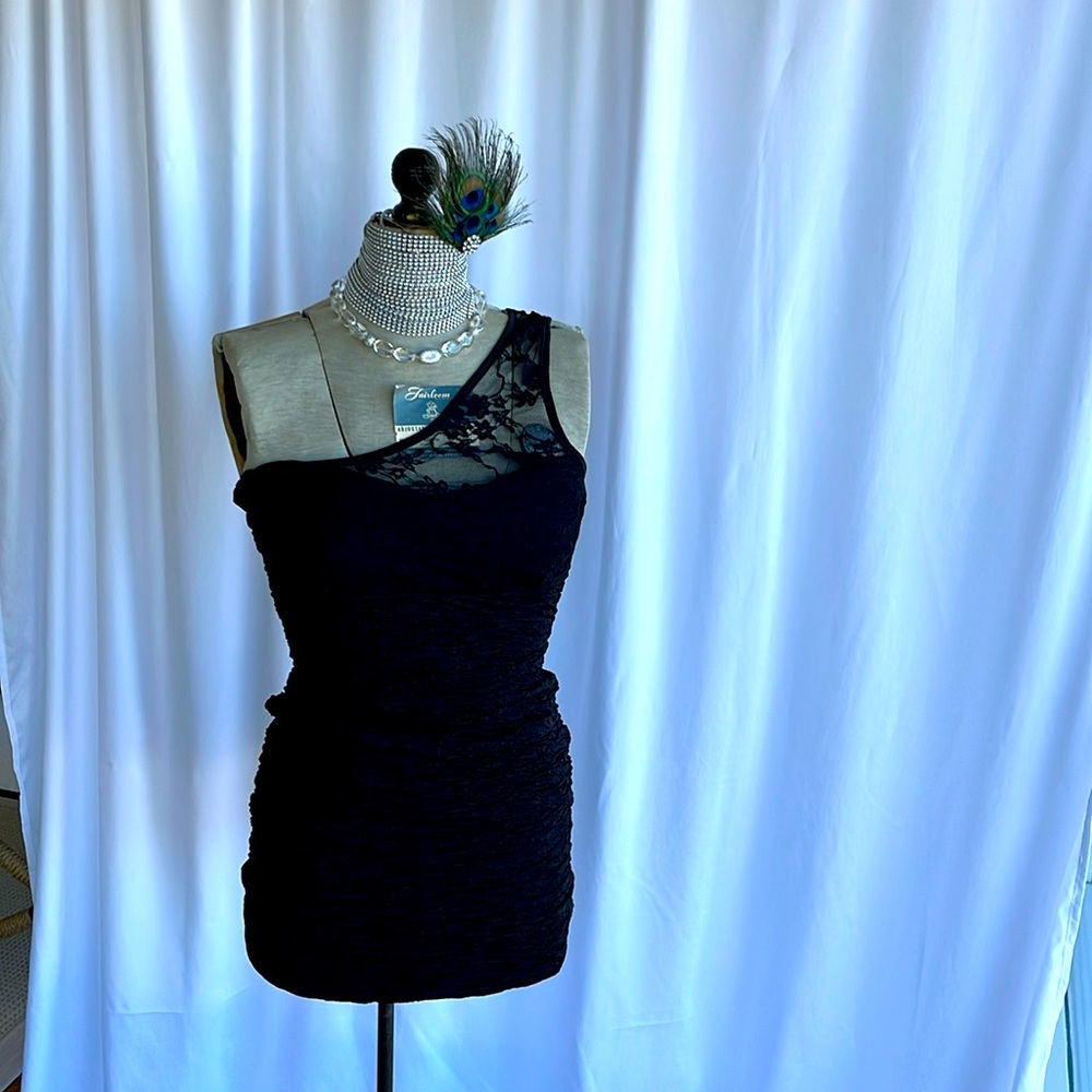 Sexy little black dress, one lace shoulder M rushed material.Fun night out or in